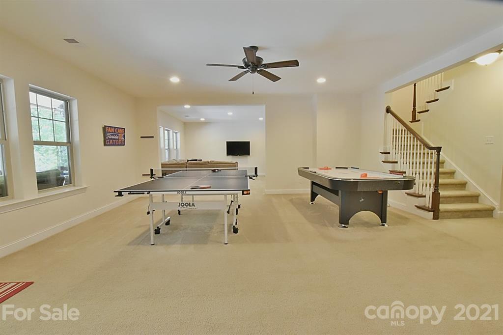 922 Castlewatch Drive Fort Mill, SC 29708 - Photo 24 of 38 a living room with furniture and white walls