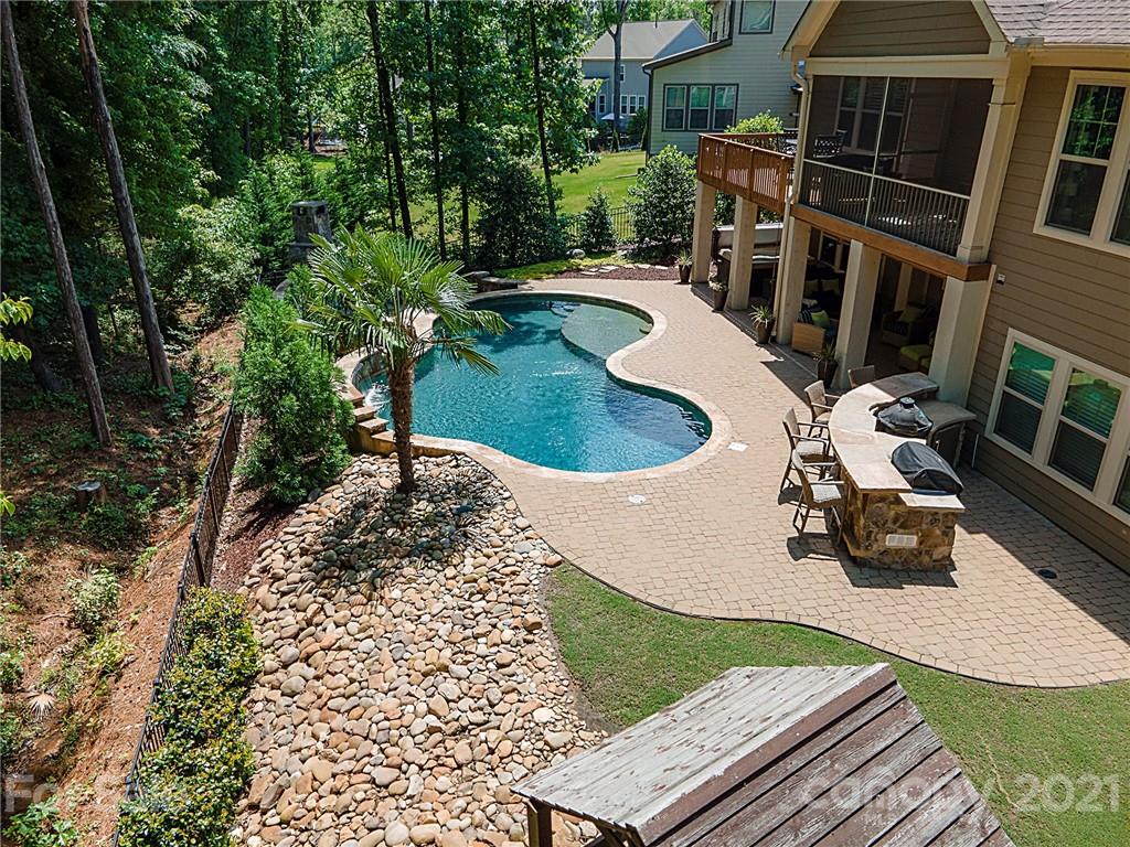 922 Castlewatch Drive Fort Mill, SC 29708 - Photo 29 of 38 an aerial view of a house with garden space and sitting area