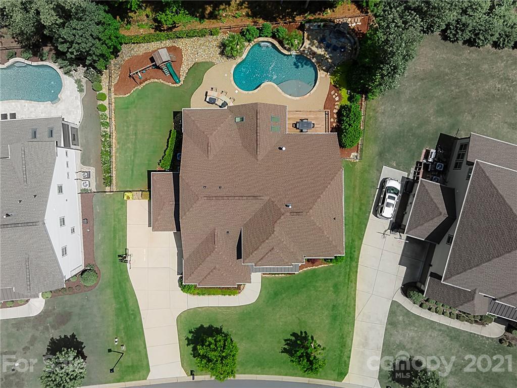 922 Castlewatch Drive Fort Mill, SC 29708 - Photo 38 of 38 an aerial view of a house with a garden and pool