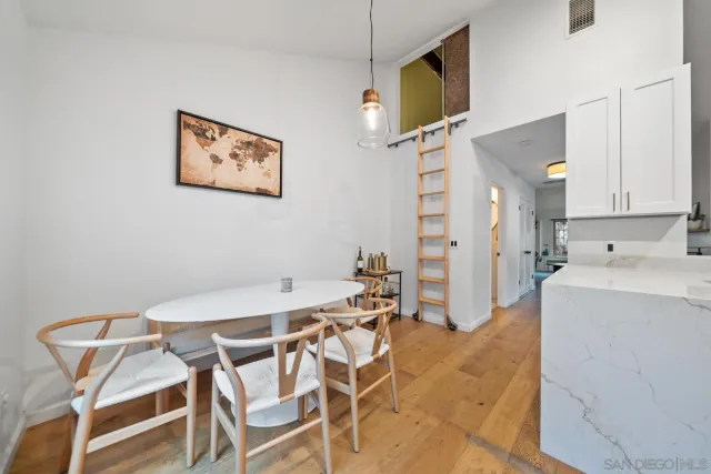 a view of a dining room with furniture