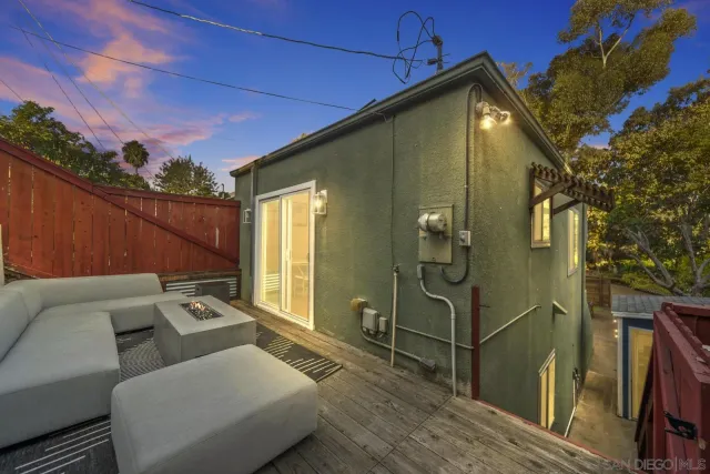a backyard of a house with seating space