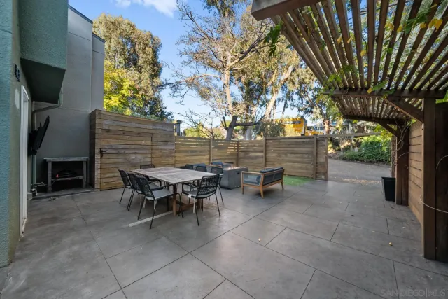 a view of a tables and chairs in the patio
