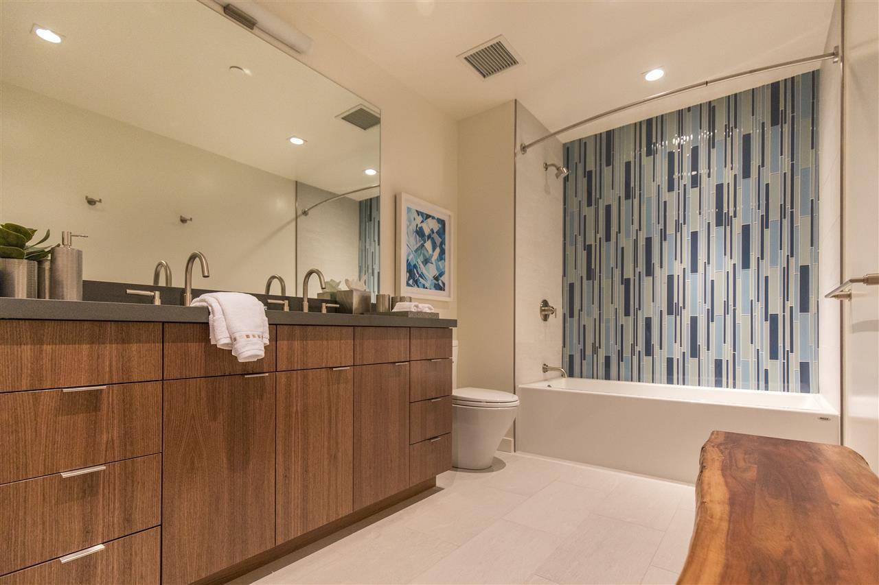 15120 Boulder Place, Unit 3 Truckee, CA 96161 - Photo 11 of 19 a bathroom with a double vanity sink and mirror