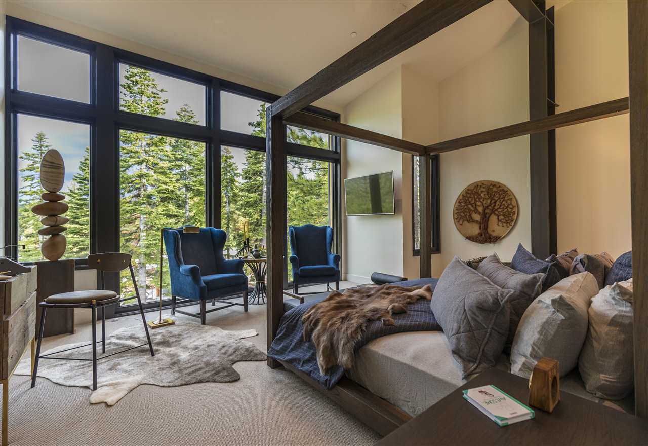 15120 Boulder Place, Unit 3 Truckee, CA 96161 - Photo 15 of 19 a bed sitting in a bedroom next to a window