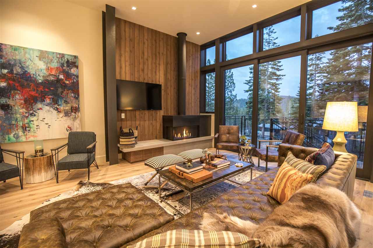 15120 Boulder Place, Unit 3 Truckee, CA 96161 - Photo 2 of 19 a living room with furniture fireplace and a flat screen tv