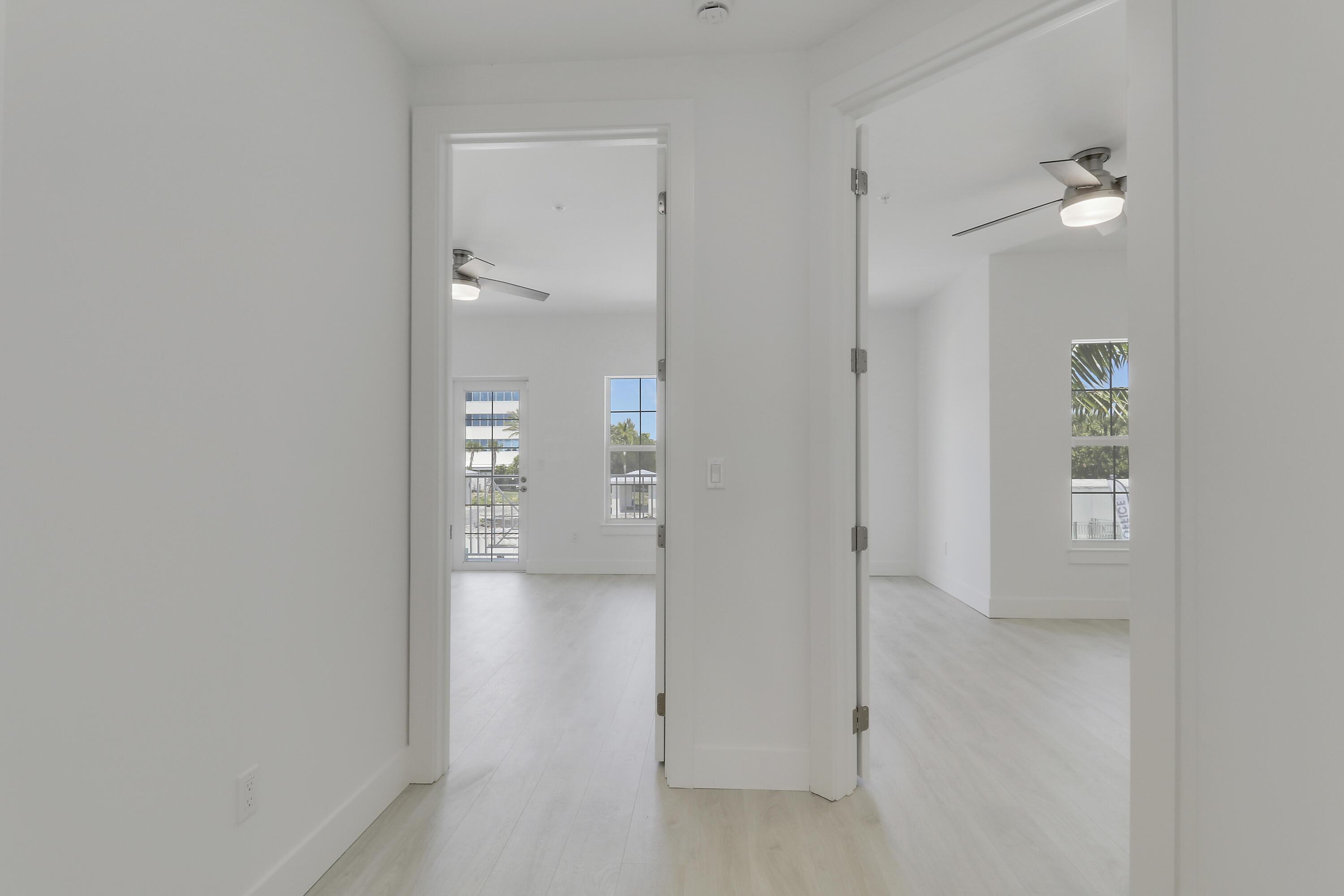 120 Water Pointe Place, Unit 3 Jupiter, FL 33477 - Photo 12 of 36 wooden floor in a hall with an entryway