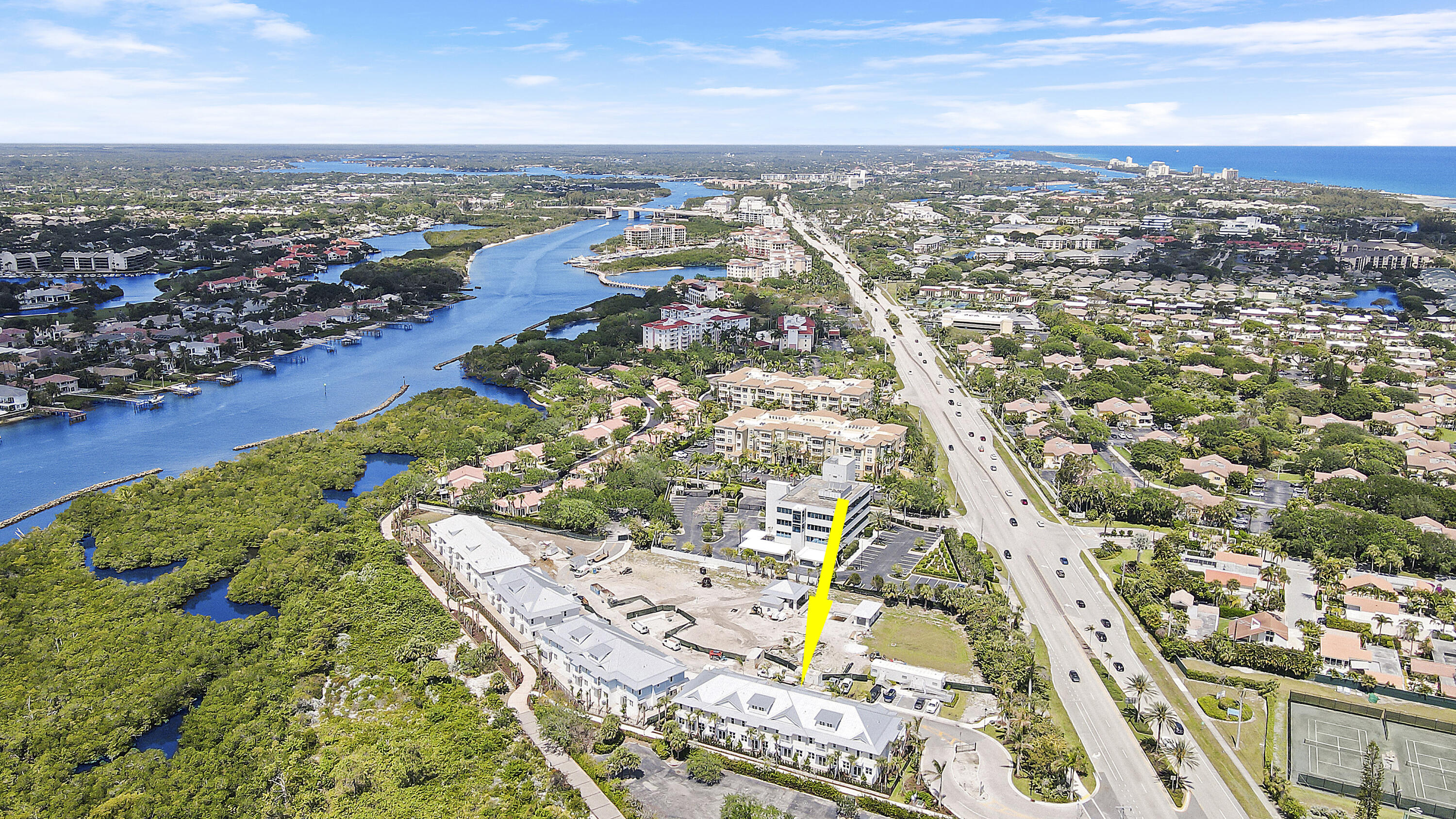 120 Water Pointe Place, Unit 3 Jupiter, FL 33477 - Photo 3 of 36 an aerial view of residential houses with outdoor space