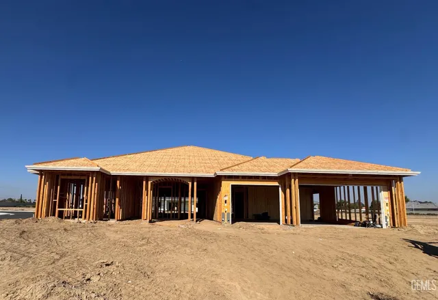 a front view of a house with glass windows