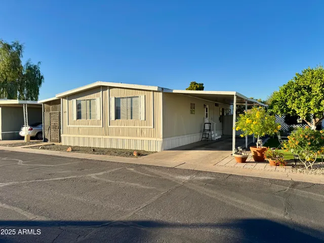 a front view of a house with a garage