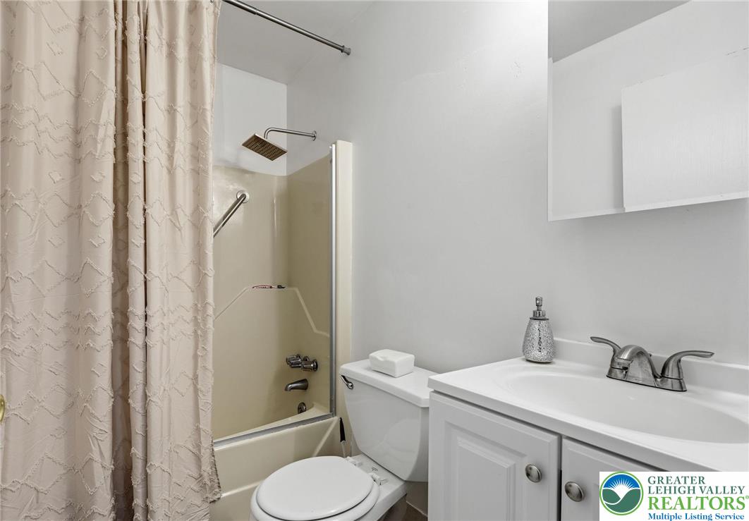 104 Scotch Pine Court Dingmans Ferry, PA 18328 - Photo 17 of 41 a bathroom with a sink toilet and shower