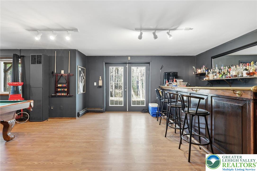 104 Scotch Pine Court Dingmans Ferry, PA 18328 - Photo 30 of 41 a dining room with furniture and window