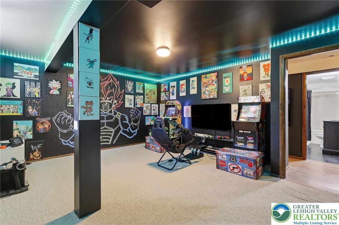 104 Scotch Pine Court Dingmans Ferry, PA 18328 - Photo 33 of 41 a view of a room with gym equipment