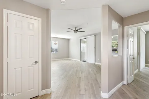 wooden floor in a hall with an entryway