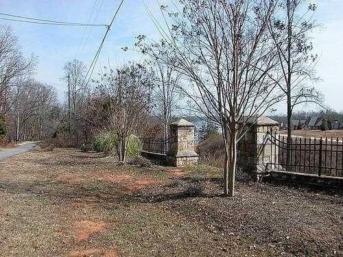 9030 Old Terry Ford Road Gainesville, GA 30506 - Photo 11 of 21 a view of a yard with a tree
