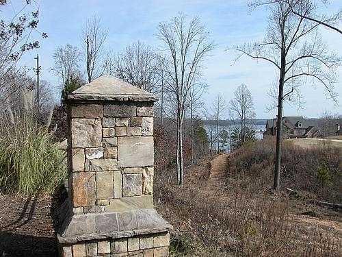 9030 Old Terry Ford Road Gainesville, GA 30506 - Photo 17 of 21 a roof deck covered with tall trees