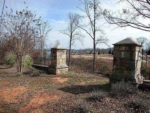9030 Old Terry Ford Road Gainesville, GA 30506 - Photo 3 of 21 a backyard of a house with lots of green space