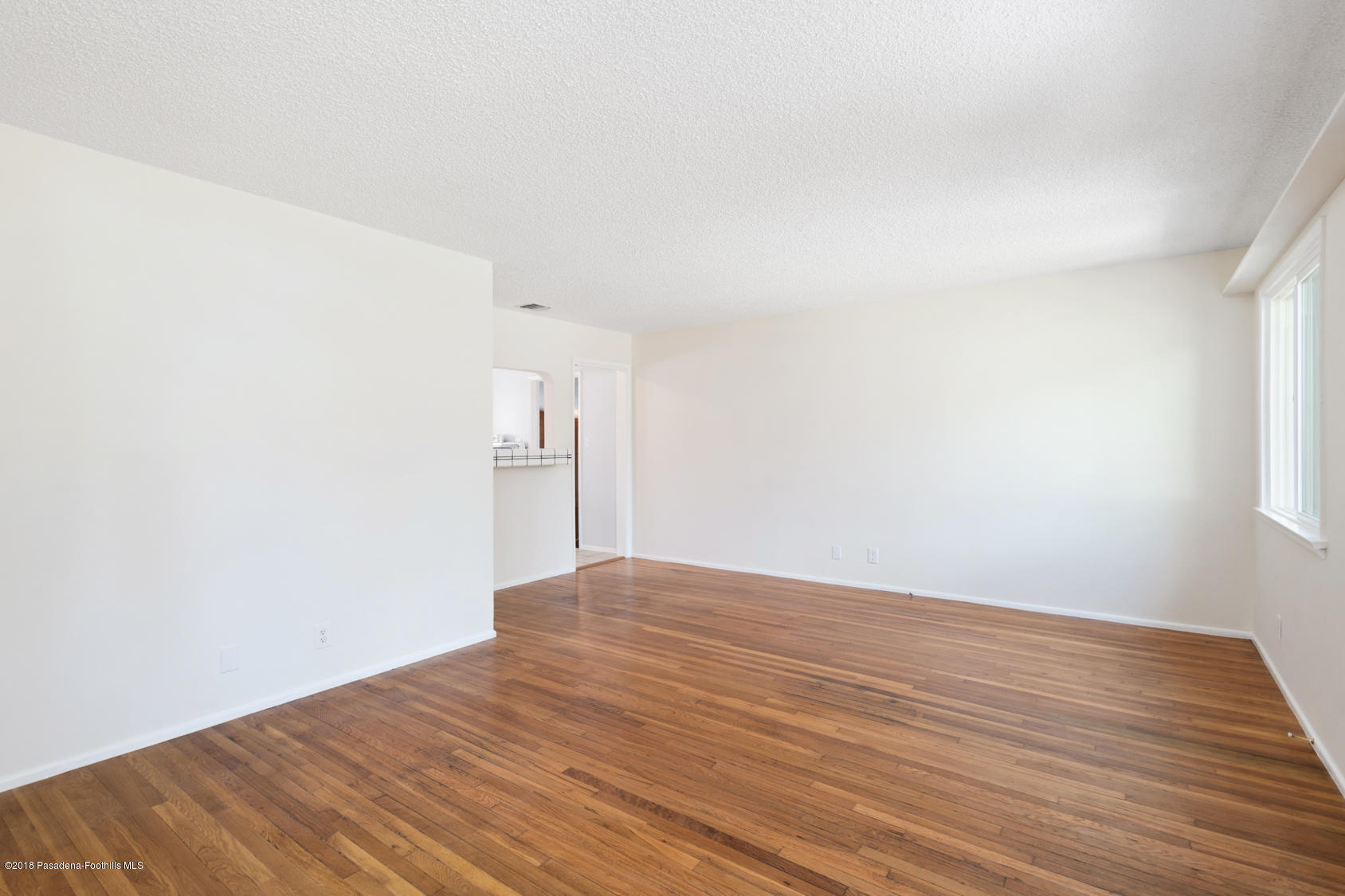 4286 Aralia Road Altadena, CA 91001 - Photo 12 of 22 a view of empty room with wooden floor