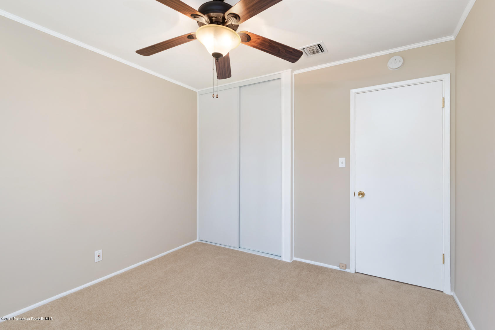 4286 Aralia Road Altadena, CA 91001 - Photo 18 of 22 an empty room with a fan & a ceiling fan