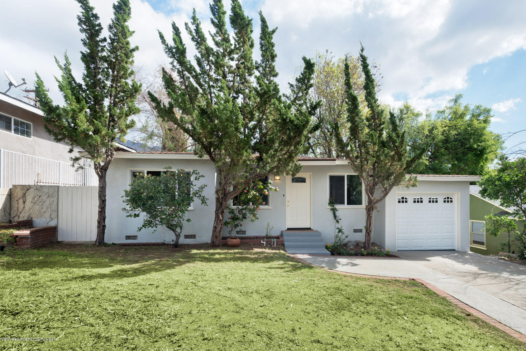 4286 Aralia Road Altadena, CA 91001 - Photo 21 of 22 a view of a house with backyard and a tree