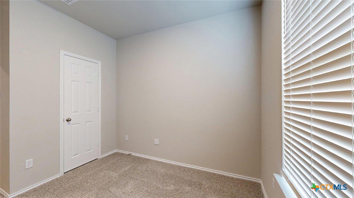 1111 Stone Vly Road Temple, TX 76502 - Photo 11 of 21 an empty room with windows