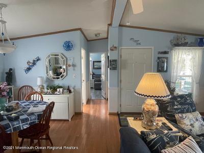 36 Pine Ridge Boulevard Whiting, NJ 08759 - Photo 5 of 19 Living room reverse