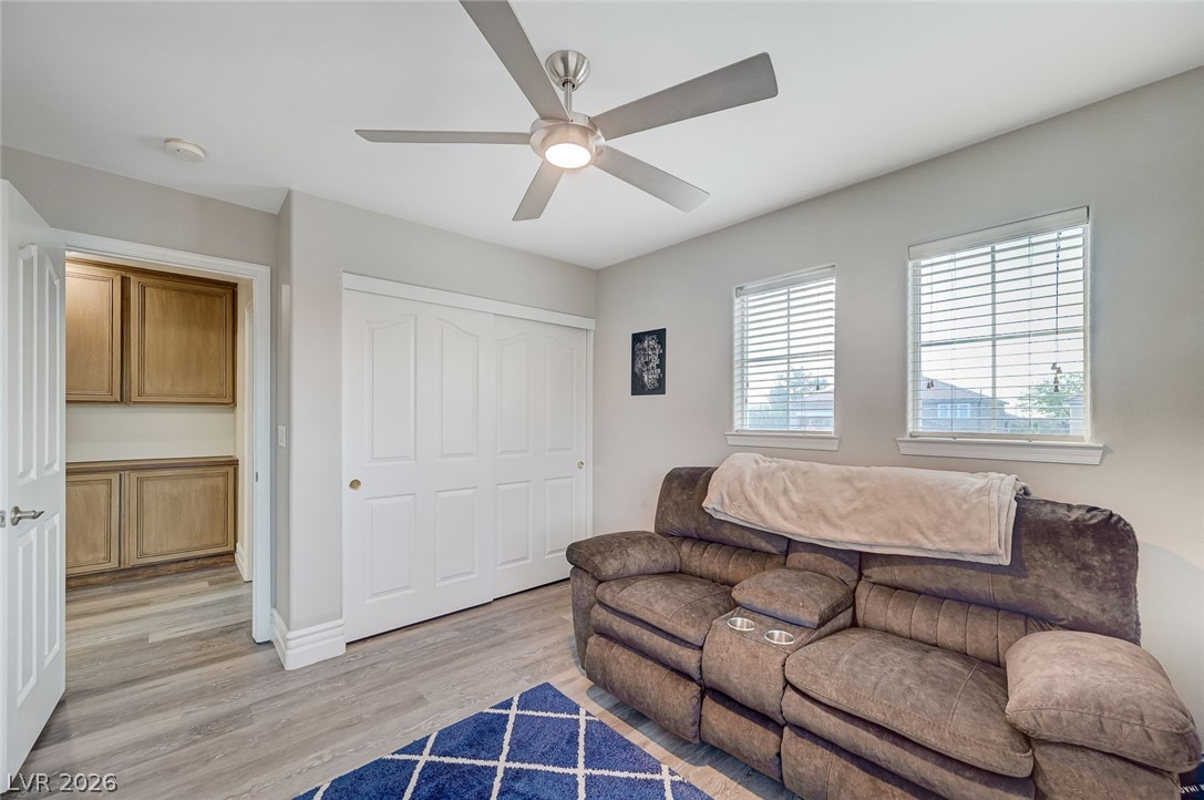 2391 Rainswept Avenue Henderson, NV 89052 - Photo 50 of 62 This versatile room features durable flooring and abundant natural light, perfect for various uses.