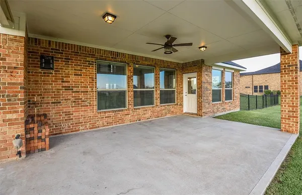 a view of an empty room with a balcony