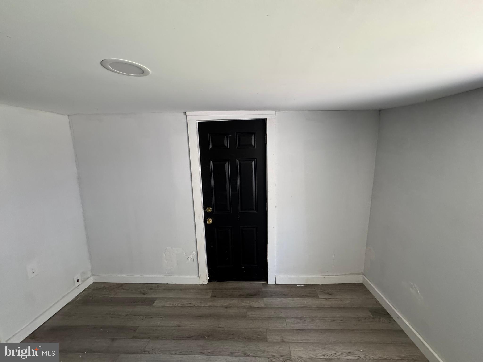395 Tansboro Road Berlin, NJ 08009 - Photo 19 of 47 a view of an empty room with wooden floor