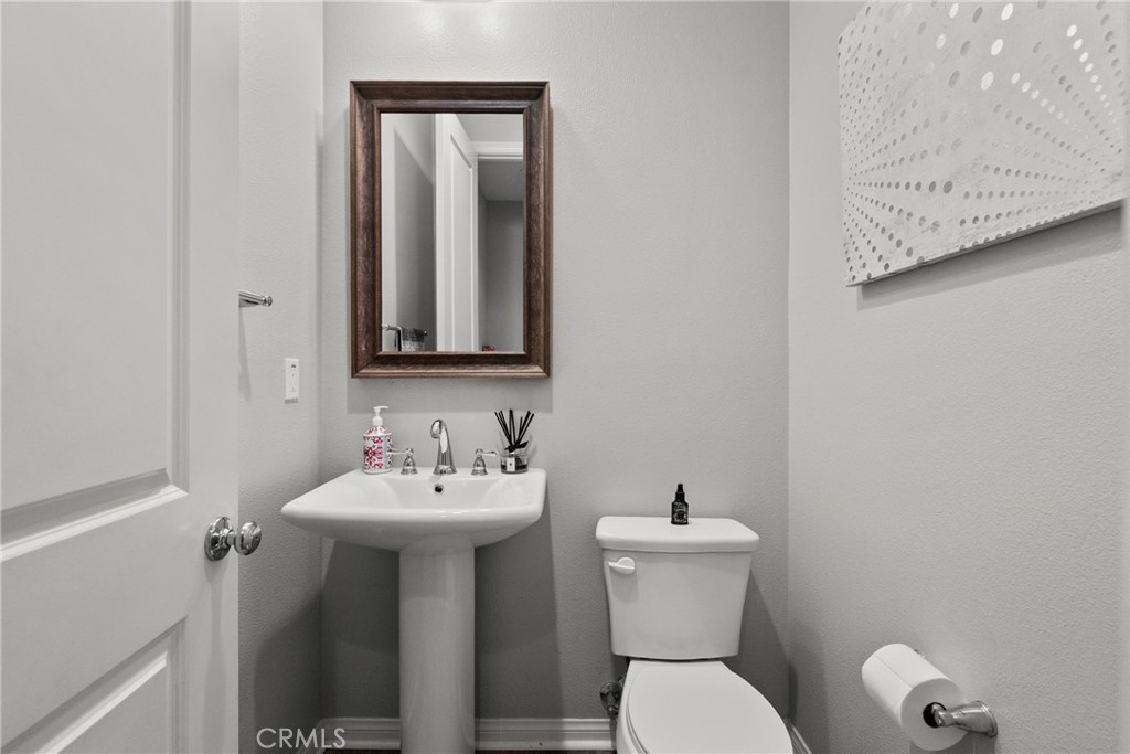 232 River Street Fillmore, CA 93015 - Photo 19 of 61 Modern powder room downstairs, clean and functionality for guests.