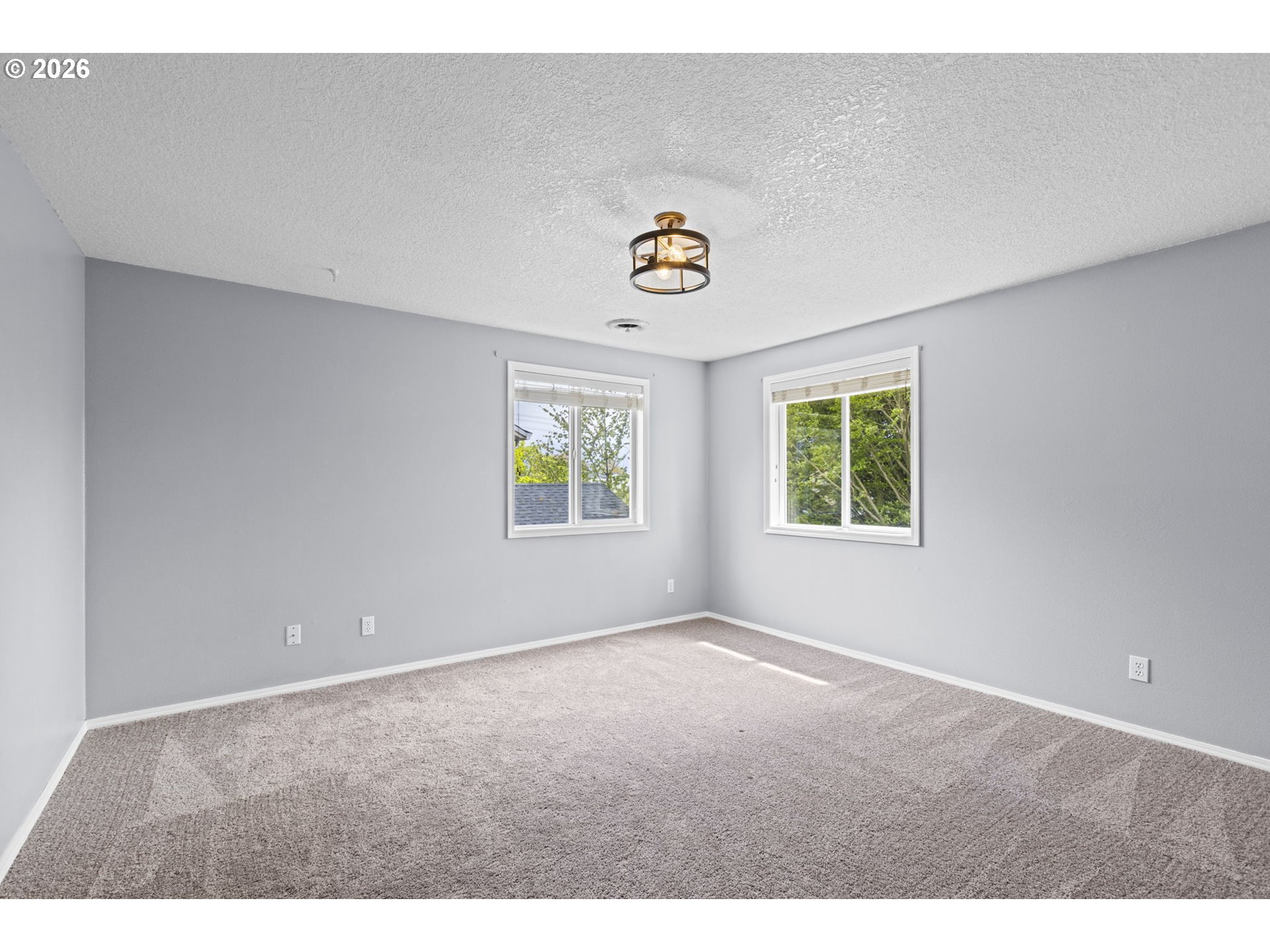 21558 Southwest Longacre Street Beaverton, OR 97003 - Photo 25 of 41 a view of an empty room with a window