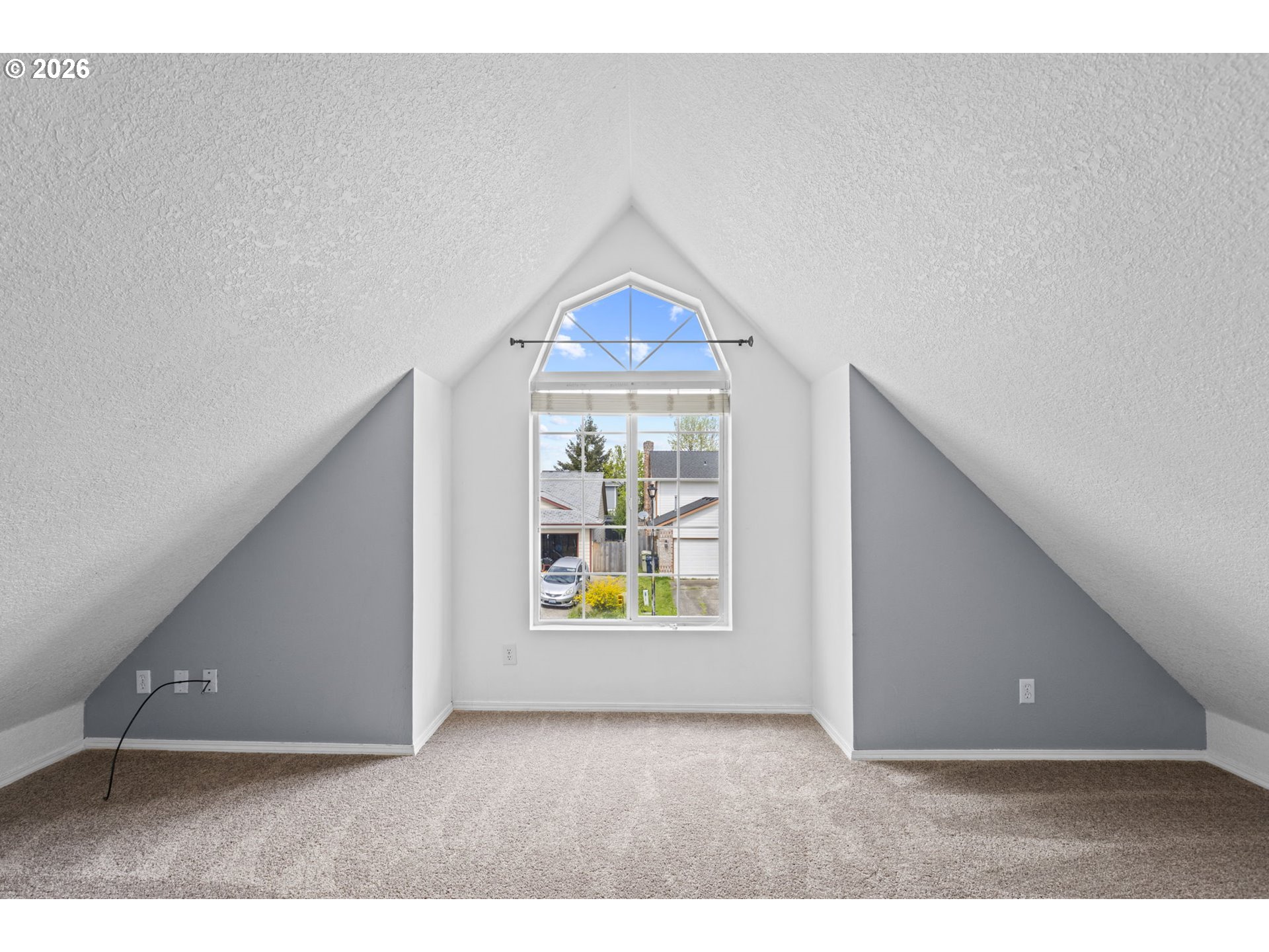21558 Southwest Longacre Street Beaverton, OR 97003 - Photo 27 of 41 a view of an empty room and a window