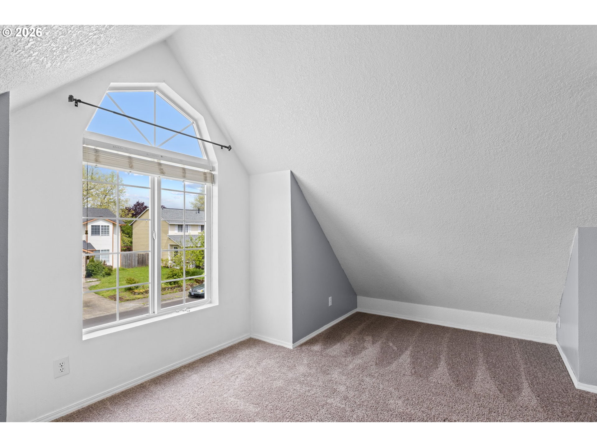 21558 Southwest Longacre Street Beaverton, OR 97003 - Photo 29 of 41 a view of an empty room with a window