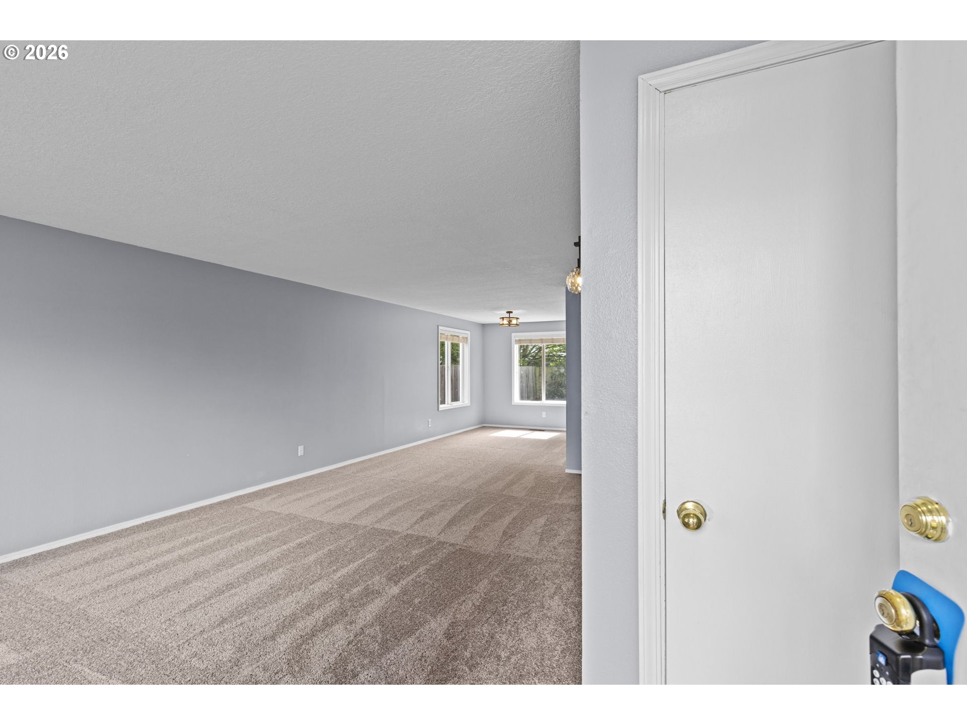 21558 Southwest Longacre Street Beaverton, OR 97003 - Photo 4 of 41 a view of an empty room