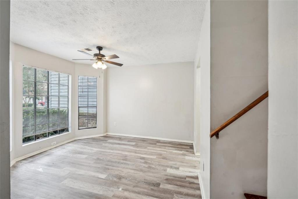703 Pine Tree Trail Atlanta, GA 30349 - Photo 6 of 32 a view of an empty room with a window