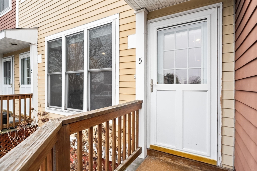910 Saratoga Street, Unit 5 Boston, MA 02128 - Photo 20 of 24 a view of a balcony with a window
