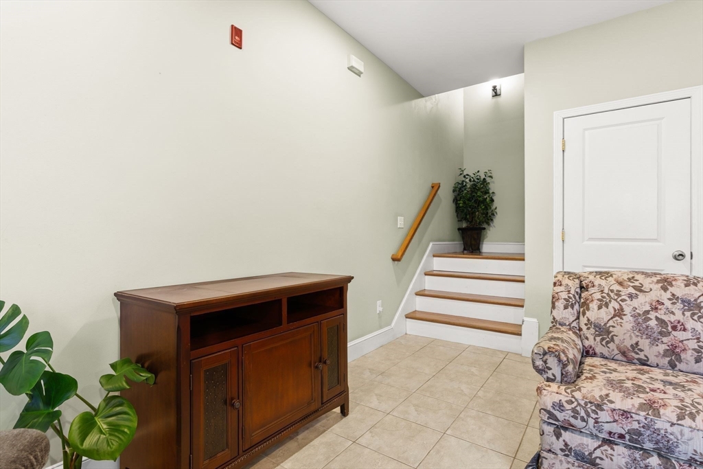 910 Saratoga Street, Unit 5 Boston, MA 02128 - Photo 9 of 24 a view of entryway with wooden floor