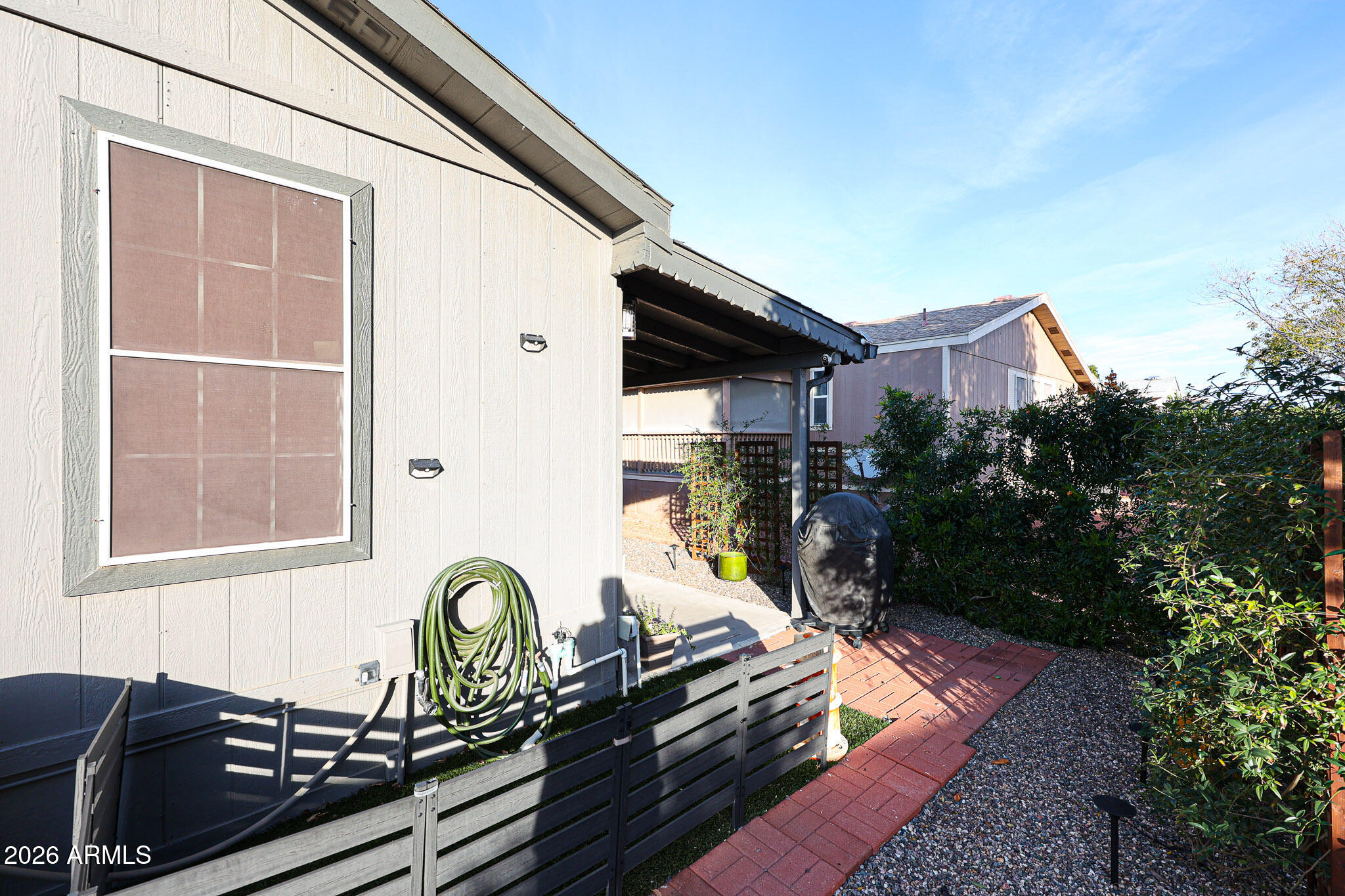 3901 East Pinnacle Peak Road, Unit 109 Phoenix, AZ 85050 - Photo 30 of 31 a couple of table and chairs in patio