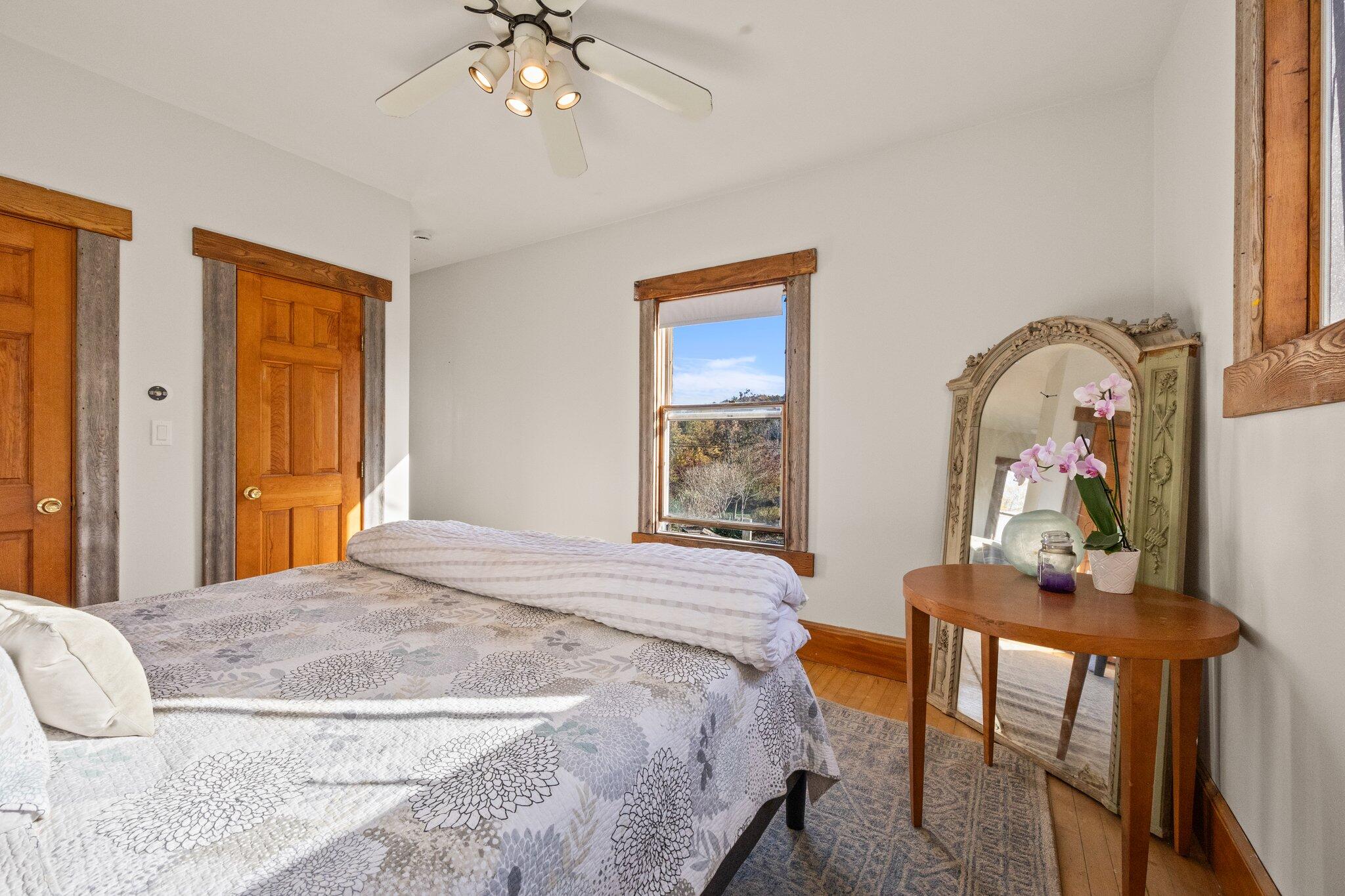 9 Peters Pond Road Truro, MA 02666 - Photo 20 of 35 a bedroom with a bed and a dresser