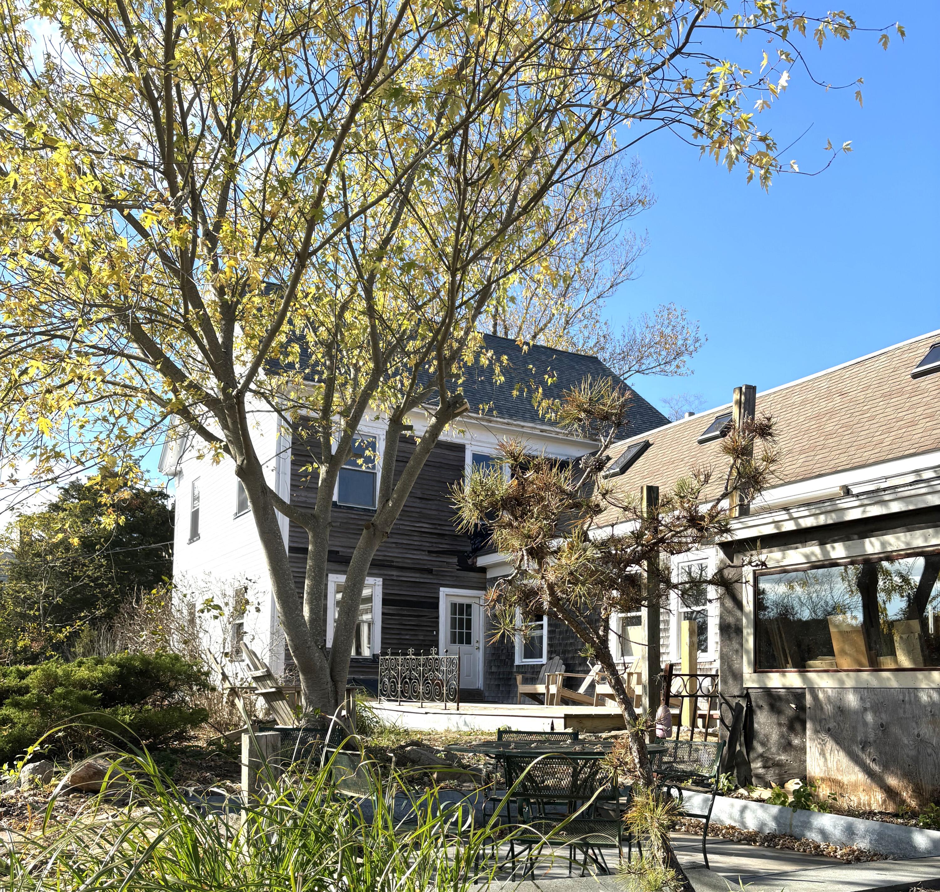 9 Peters Pond Road Truro, MA 02666 - Photo 5 of 35 a view of a building with a tree