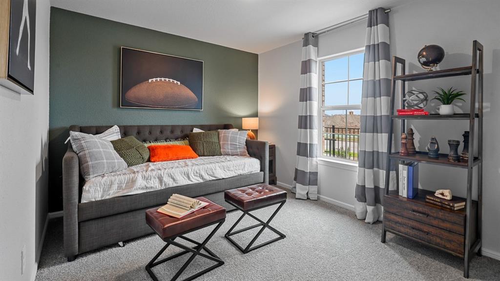 213 EC Tally Drive Justin, TX 76247 - Photo 24 of 40 a living room with furniture and a lamp