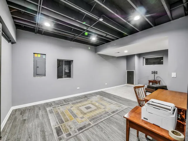 a view of kitchen with wooden floor