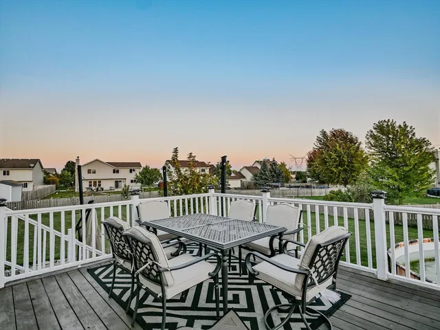 a view of a patio on wooden deck and patio