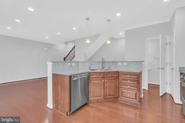 a bathroom with a sink a mirror and a shower