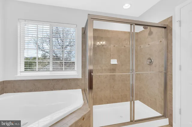 a view of balcony with wooden floor and fence