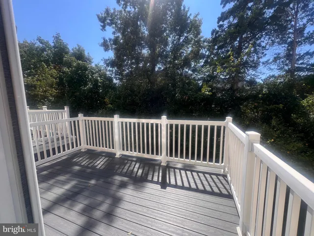 a bathroom with a bathtub and a toilet