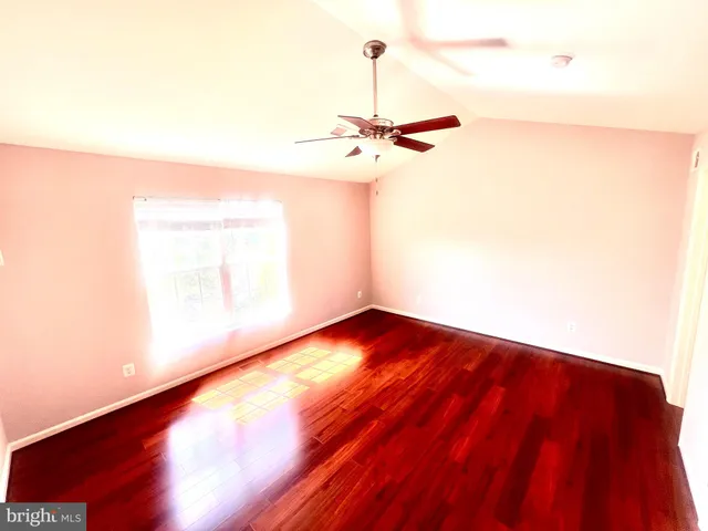 a bathroom with a tub and shower