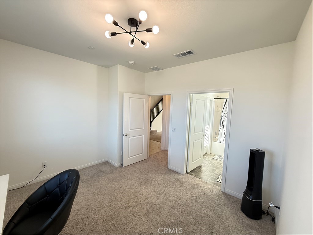 4461 Hickory Court Perris, CA 92571 - Photo 13 of 31 a view of a livingroom with a fireplace