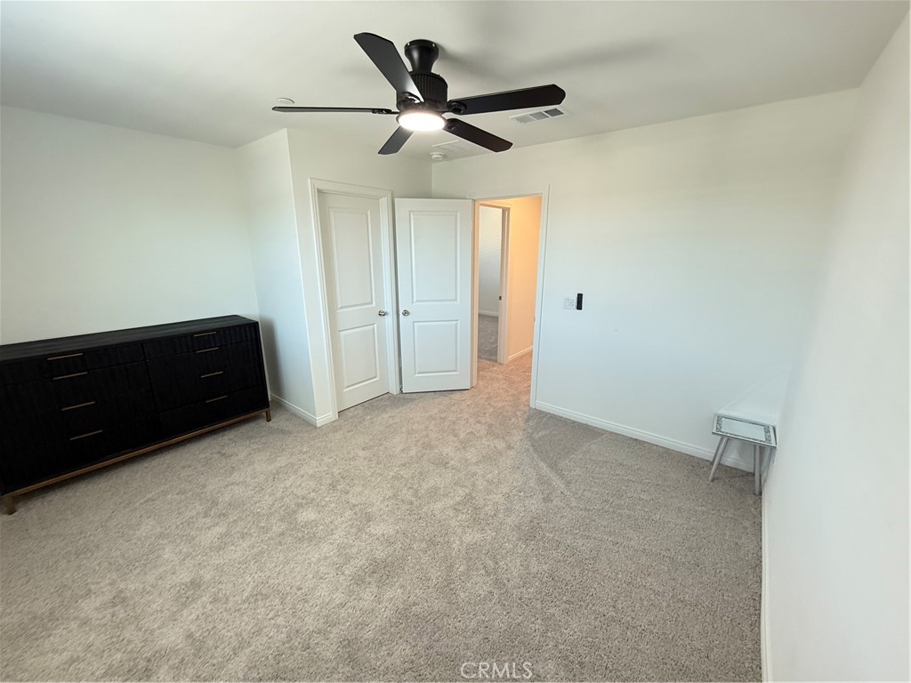 4461 Hickory Court Perris, CA 92571 - Photo 22 of 31 a view of room with ceiling fan