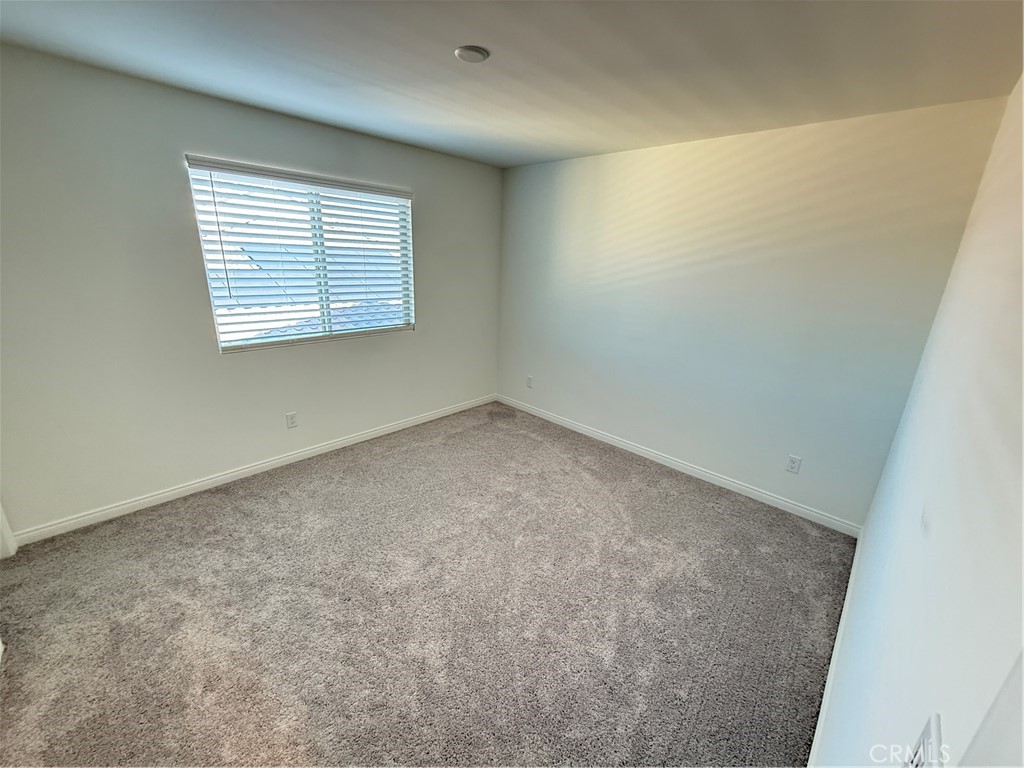4461 Hickory Court Perris, CA 92571 - Photo 25 of 31 an empty room with a window