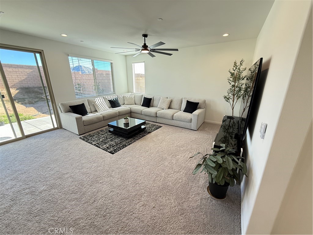 4461 Hickory Court Perris, CA 92571 - Photo 6 of 31 a living room with furniture and a large window